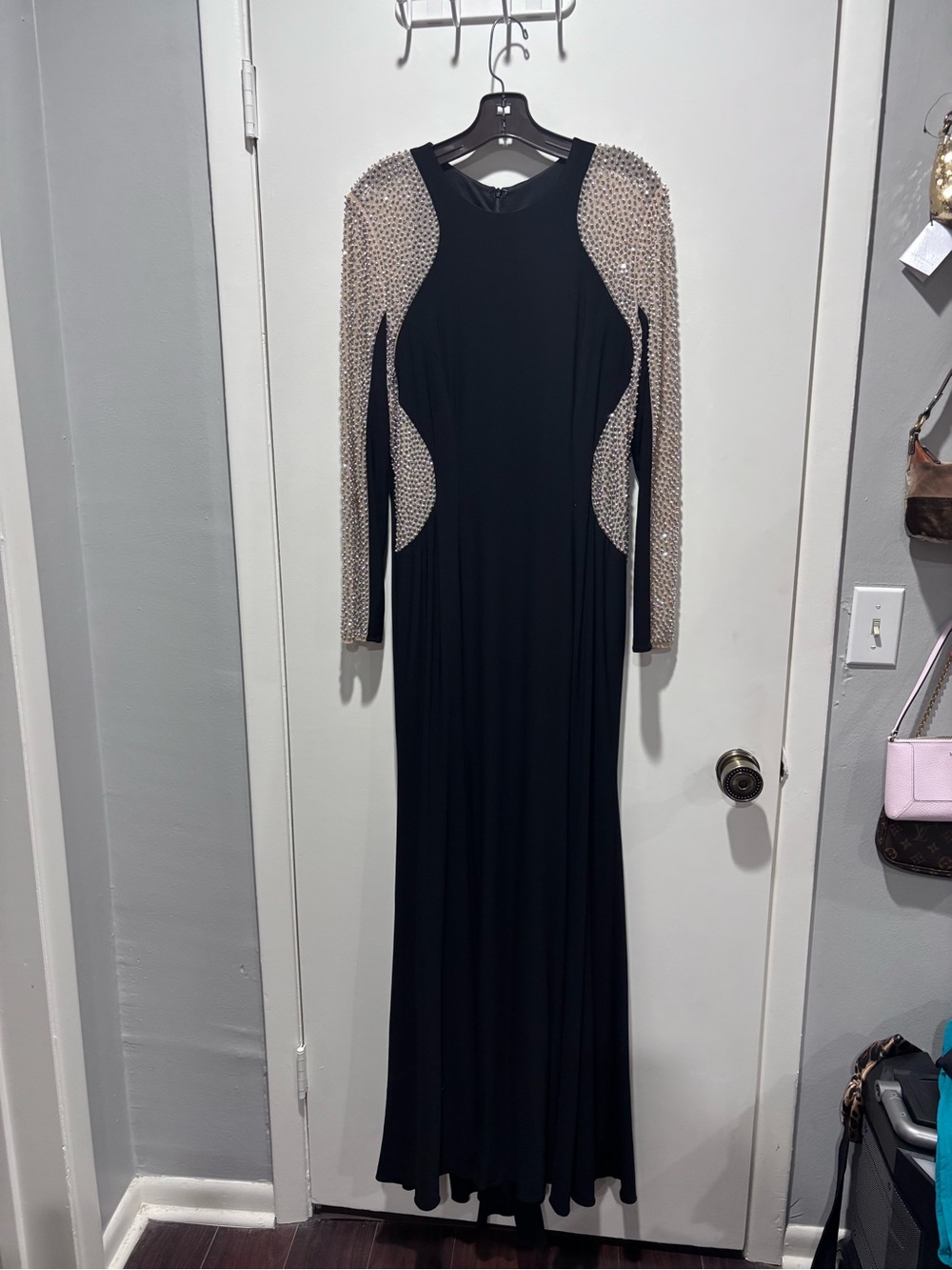 Xscape Black Gown with Beaded Nude Illusion Sleeves